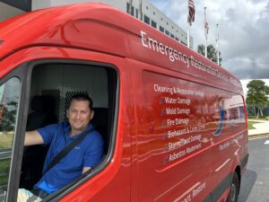 SourceOne Technician in company vehicle.